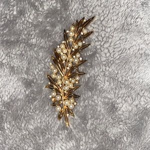 Feather and pearl brooch